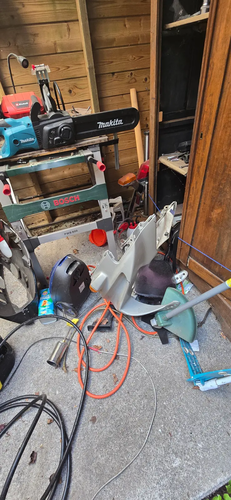 A collection of loose parts, equipment and workshop material